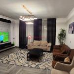 Jomo Konjit Association 200 m² U-Shape House