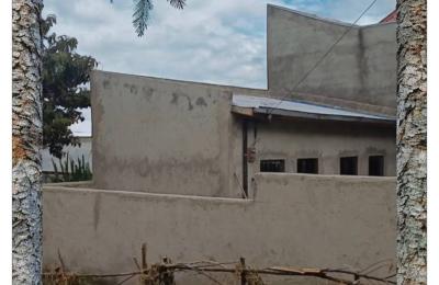 L-Shape House in Summit Figa