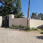 99.Megenagna AMCE 500 m² an old L-shape House (For residence or Apartment construction)